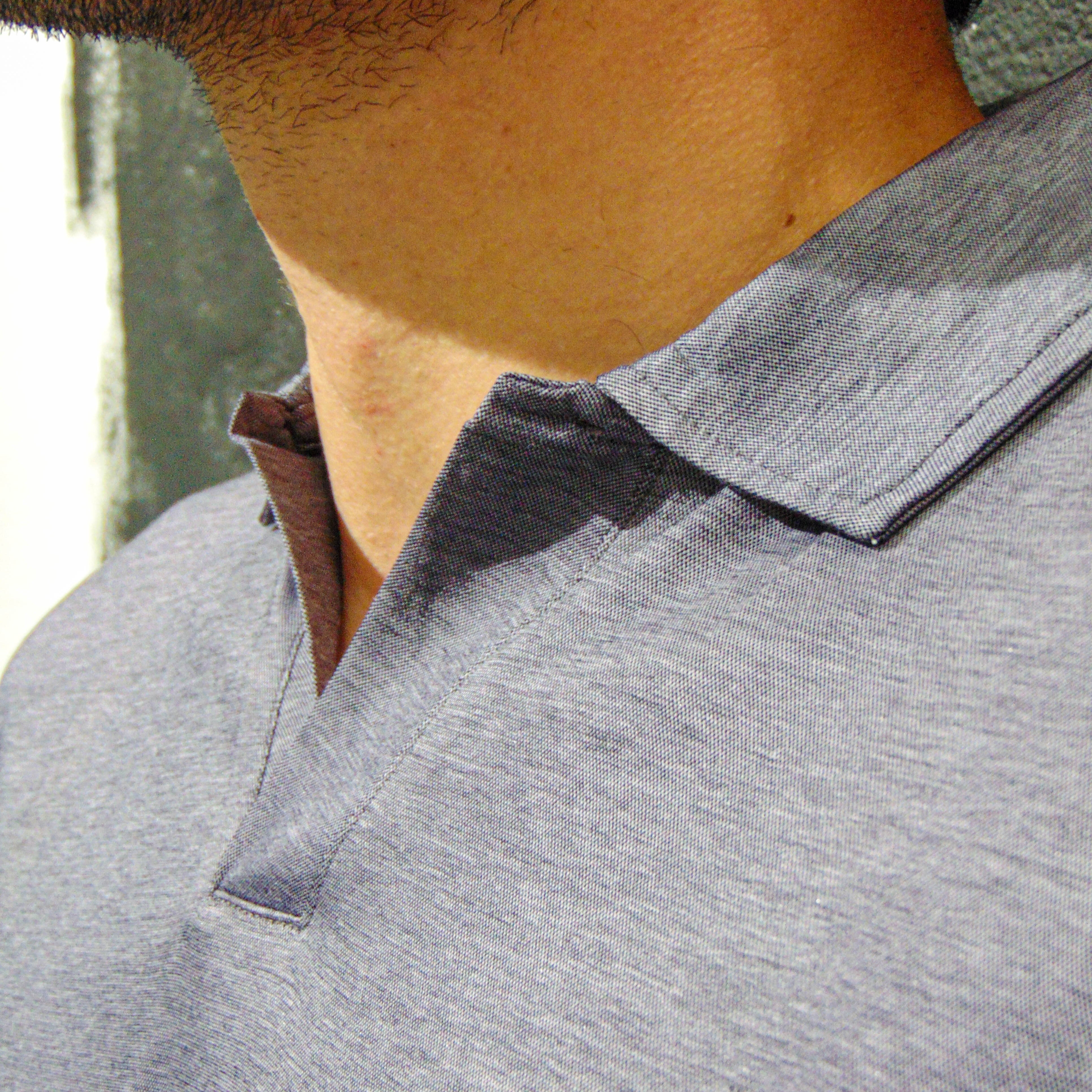 Polo OVERD scollo a V traspirante Blu/Grigio